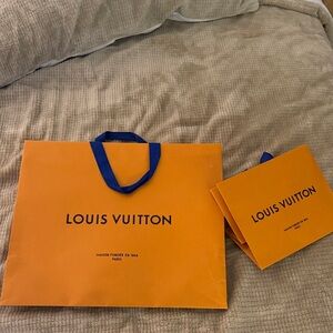 Louis Vuitton Bold Orange Bags with Blue Handles